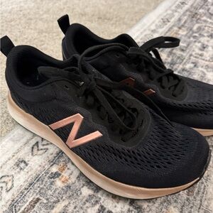 New Balance Arishi Women's Black and Rose Sneakers